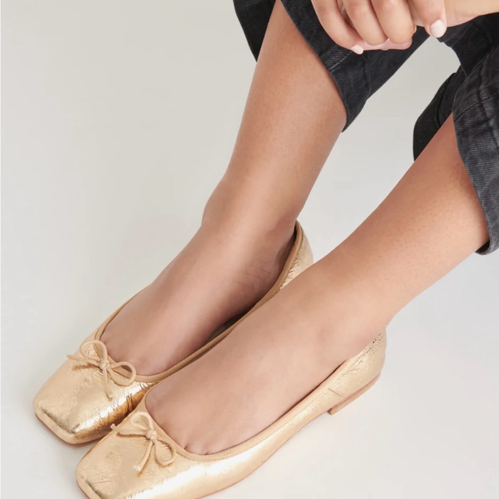 Dolce Vita Gold Flats with Rounded Toe and Decorative Bow